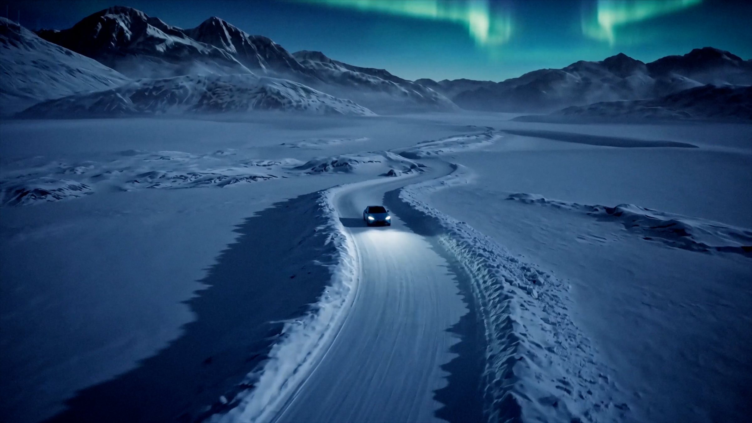 Wagon on a snow road under the aurora