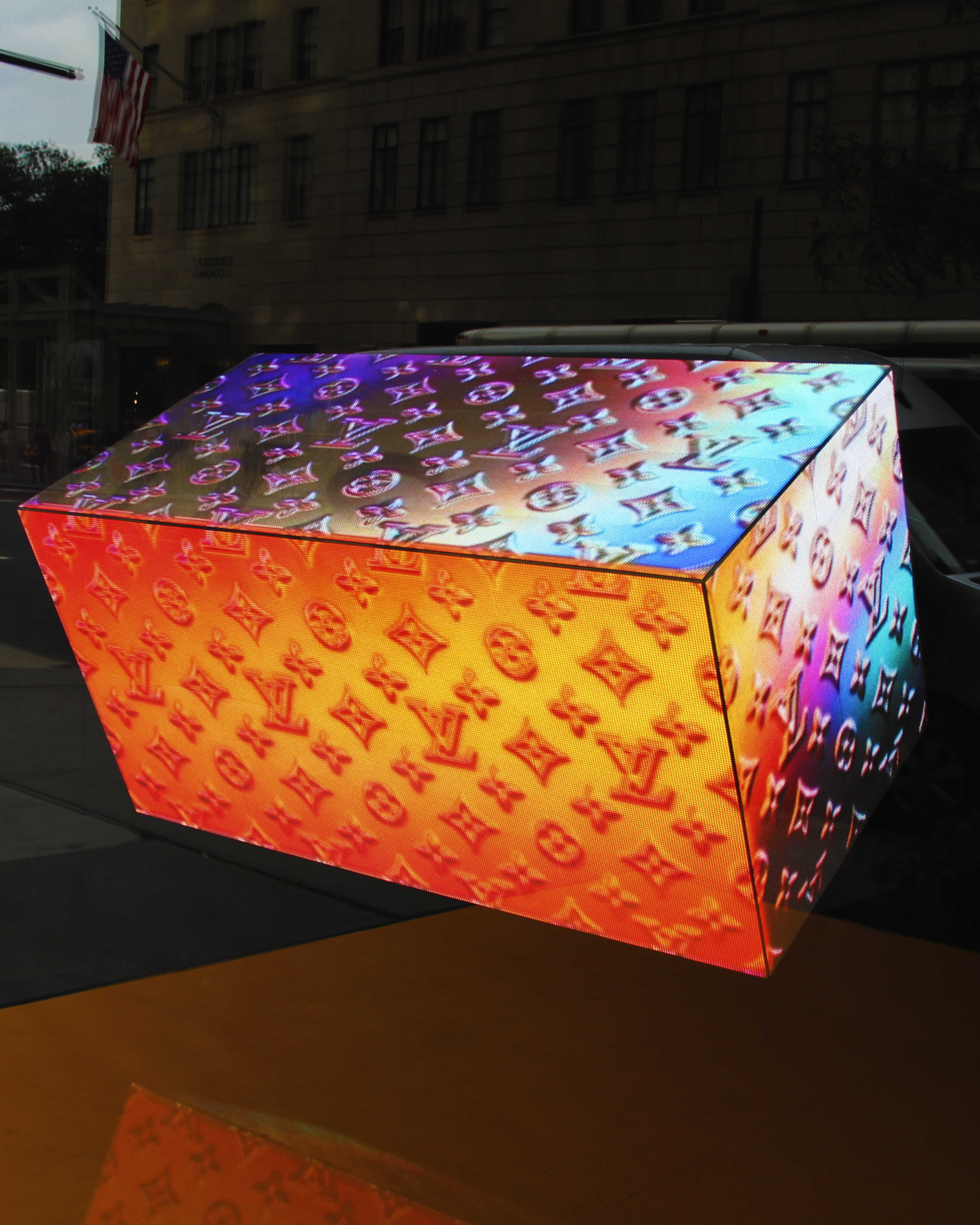 The chromatic trunk glowing in the window